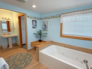 Shower, jetted tub, towels