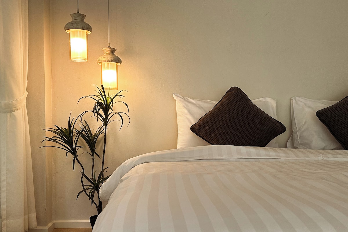 Habitación familiar | Ropa de cama hipoalergénica y artículos del minibar gratis