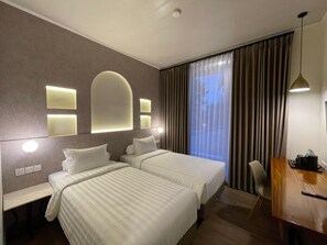 Superior Twin kamer | Een bureau, gratis wifi, beddengoed