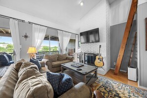 Smart TV, fireplace, books