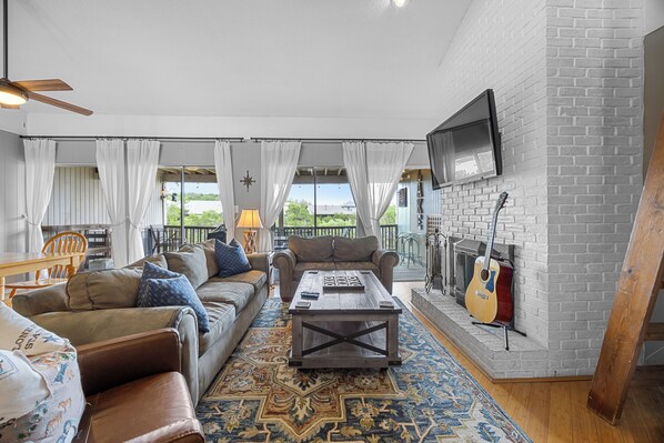 Smart TV, fireplace, books