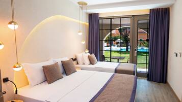 Deluxe Room, Pool View | 1 bedroom, Egyptian cotton sheets, premium bedding, minibar