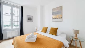 1 slaapkamer, een strijkplank/strijkijzer, wifi, beddengoed