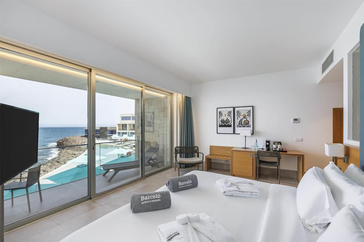 Deluxe Room, Sea View | Minibar, in-room safe, iron/ironing board, free WiFi