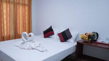 Deluxe Double Room | Desk, blackout drapes, iron/ironing board, free WiFi