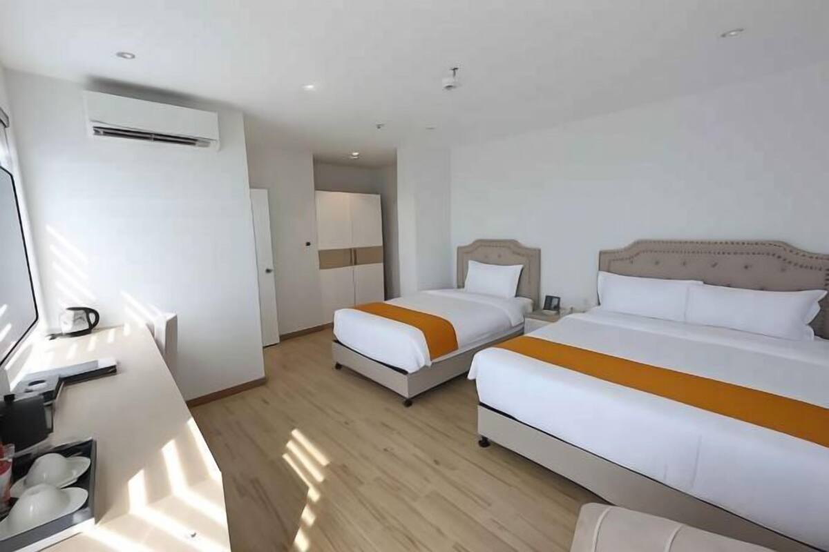 Memory foam beds, desk, laptop workspace, blackout drapes