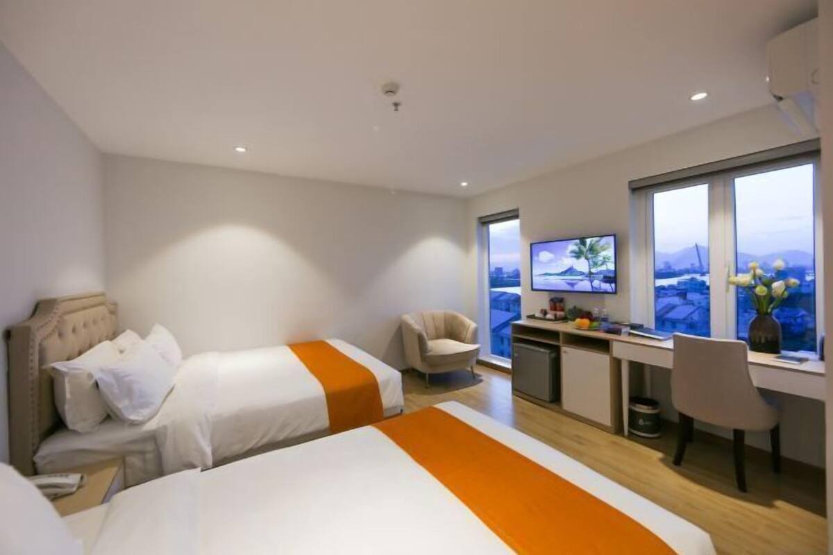 Memory foam beds, desk, laptop workspace, blackout drapes