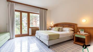 Comfort Room | 1 bedroom, minibar, in-room safe, desk