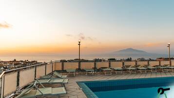 Outdoor pool, open 9:00 AM to 6:00 PM, sun loungers