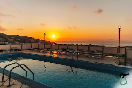 Outdoor pool, open 9:00 AM to 6:00 PM, sun loungers