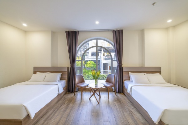 Family Quadruple Room, 2 Queen Beds, City View | Desk, free WiFi, bed sheets