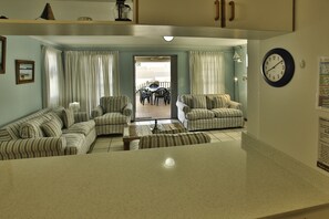 Comfort House | Living area | 42-inch flat-screen TV with satellite channels - Top Deck Langebaan 6-sleeper (Langebaan)