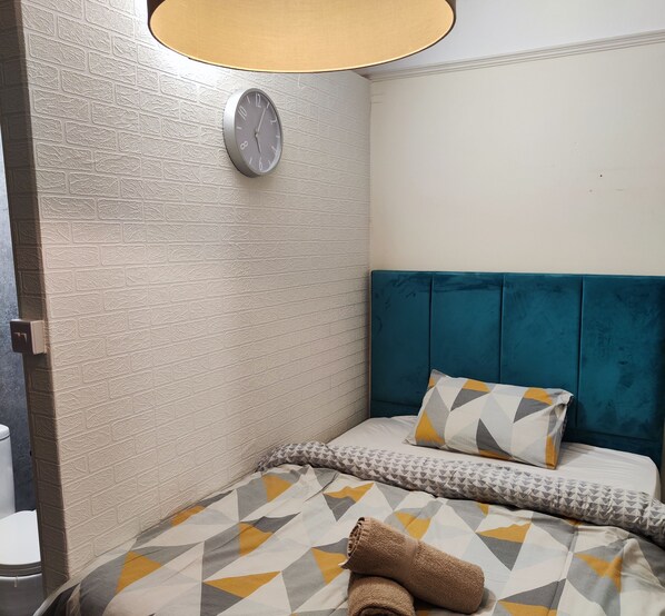 Blackout drapes, iron/ironing board, free WiFi, bed sheets