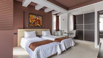 Premium bedding, down duvets, individually decorated