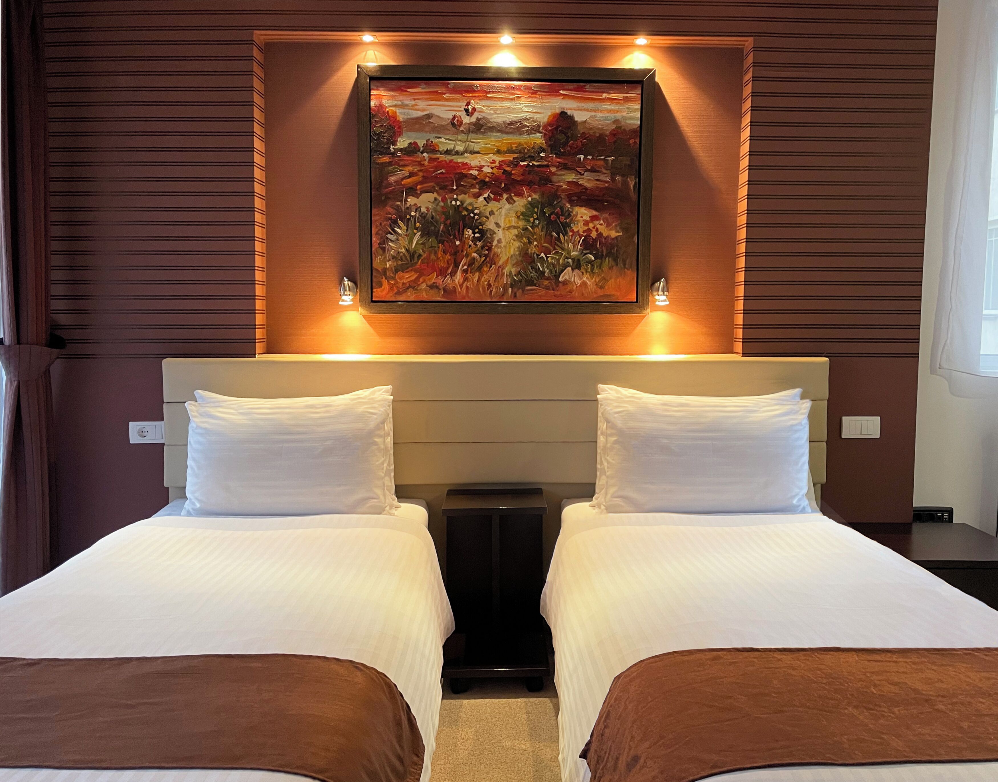 Premium bedding, down duvets, individually decorated