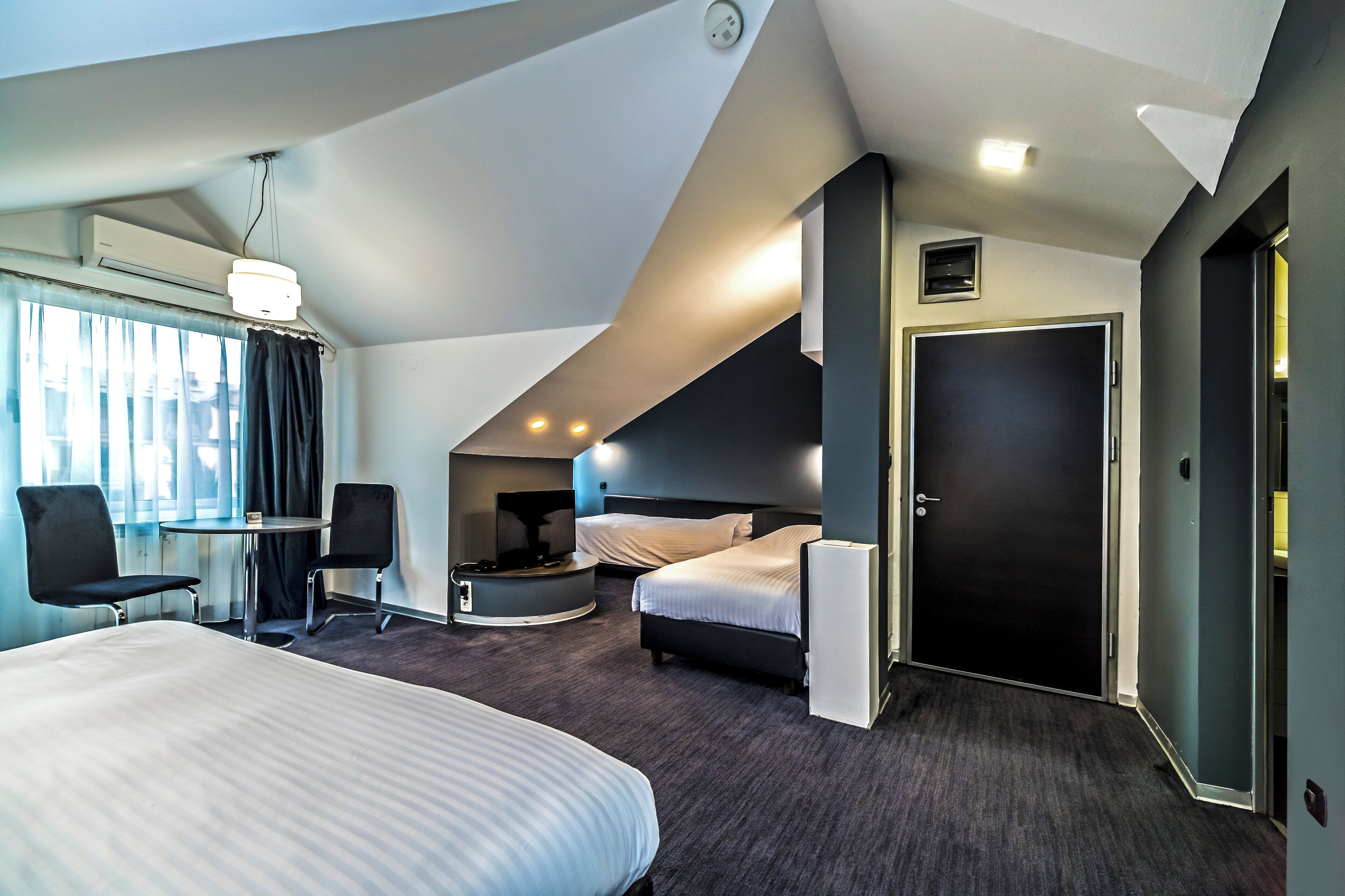 Premium bedding, down comforters, individually decorated