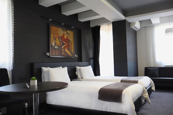 Premium bedding, down comforters, individually decorated