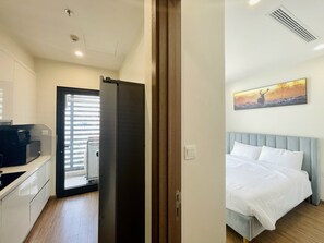 2 bedrooms, blackout drapes, soundproofing, iron/ironing board