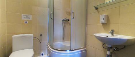 Standard Double Room | Bathroom | Shower, hair dryer, towels