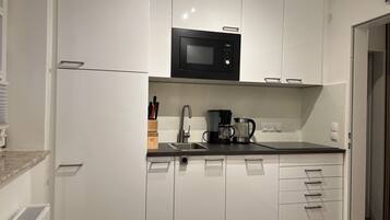 Microones, placa de cuina i rentaplats