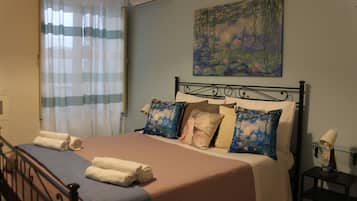 2 habitaciones, tabla de planchar con plancha y cuna de viaje