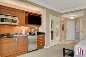 Microwave, stovetop, coffee/tea maker, cookware/dishes/utensils