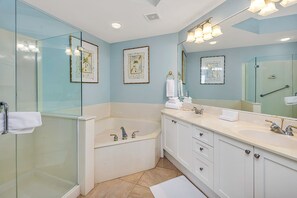 Shower, jetted tub, towels