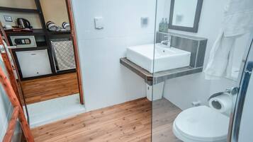 Family Triple Room | Bathroom | Shower, free toiletries, hair dryer, towels