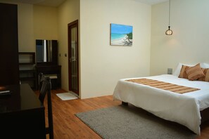 Family Room | Minibar, in-room safe, laptop workspace, iron/ironing board - Holiday Home Kelaa Retreat (Kelaa)