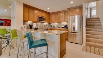 Coffee/tea maker, fridge, microwave, oven