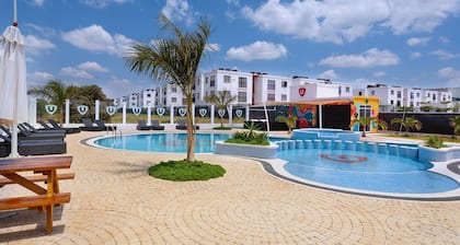 Cozy 2-bedroom apartment in Tatu City with gym, pool, & restaurant in the estate