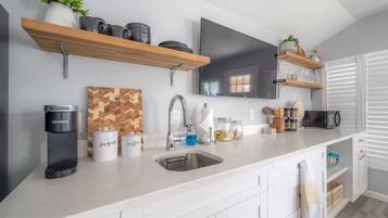 Fridge, microwave, coffee/tea maker, toaster