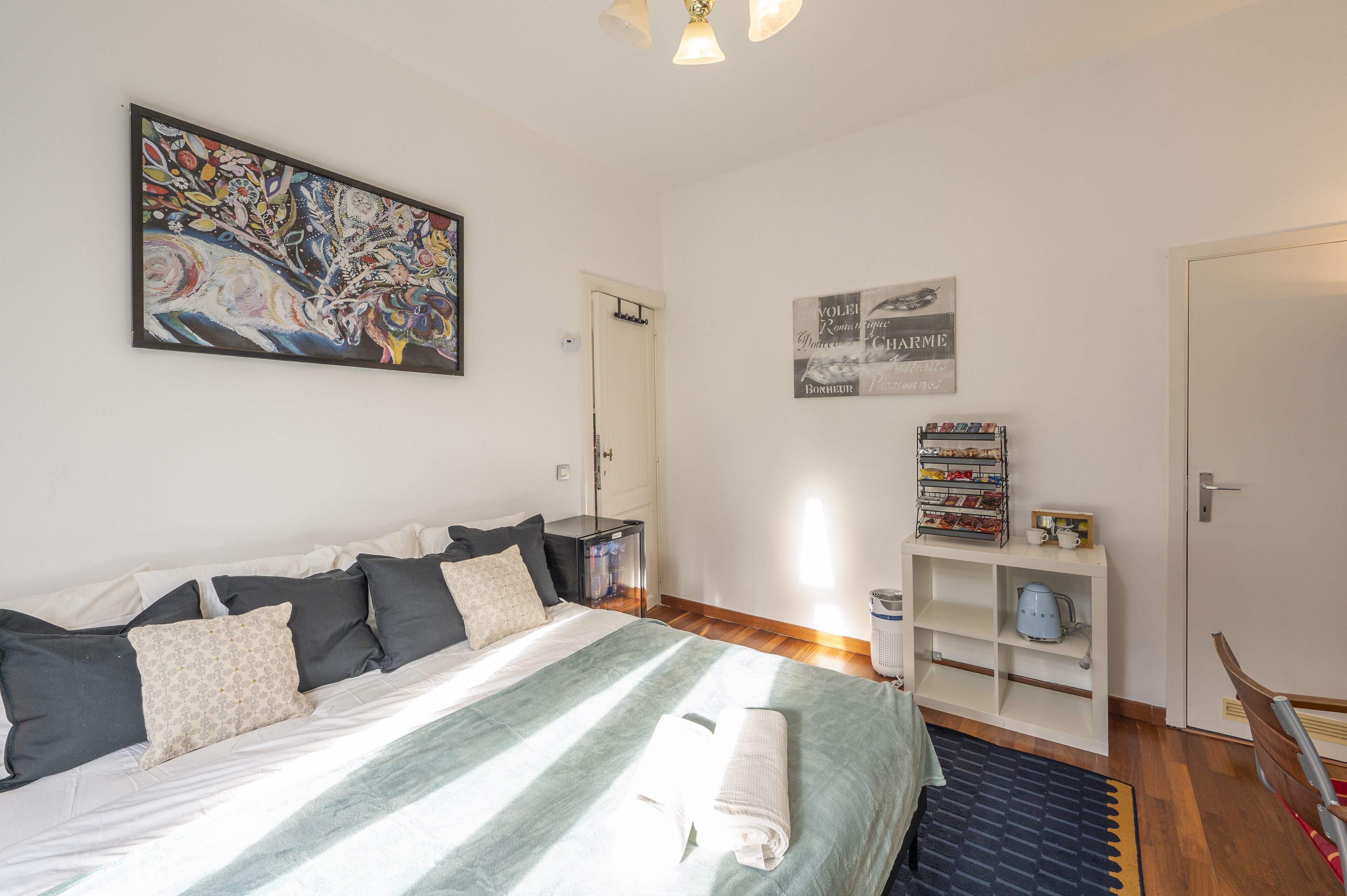 1 bedroom, desk, iron/ironing board, travel crib