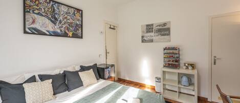 1 bedroom, desk, iron/ironing board, travel crib