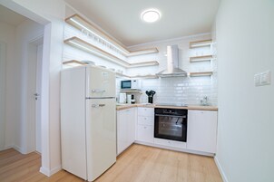 Apartment | Private kitchenette | Full-size fridge, microwave, oven, stovetop