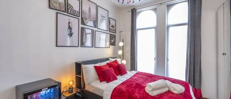 1 bedroom, desk, iron/ironing board, travel cot