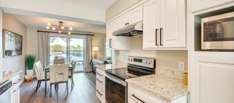 Riverfront Champlin Townhome w/ Deck & Water View!