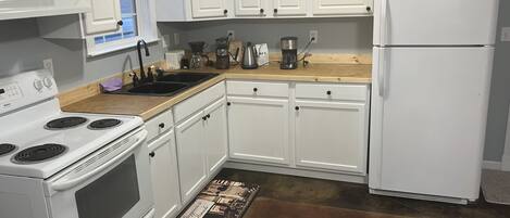 Microwave, oven, stovetop, coffee/tea maker