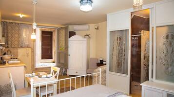 Studio | Living area | 50-inch plasma TV with satellite channels