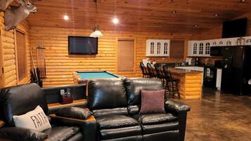 Smart TV, fireplace, DVD player, books