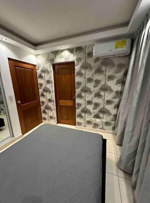 2 bedrooms, iron/ironing board, WiFi, bed sheets - Burungos Place @ Terrazas Del Caribe D-202 (Santo Domingo Este)
