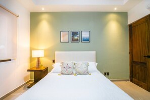 Bright and serene second bedroom with a plush queen bed and easy access to a full bathroom. - Amapas Oasis | Pool & Private BBQ (Puerto Vallarta)
