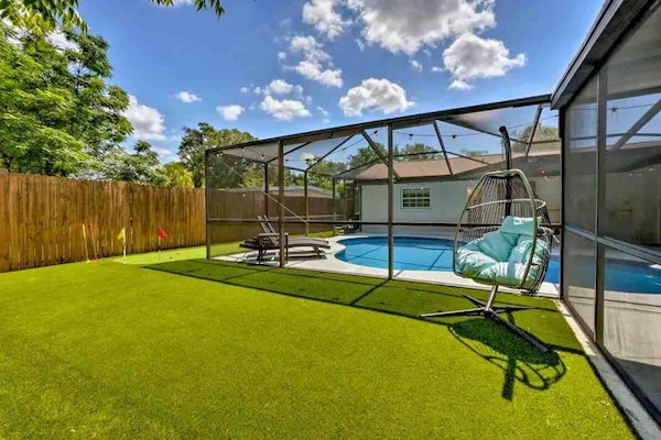 Soak up the sun in the back yard pool or swing.
