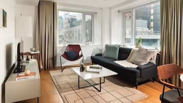 Apartment, 1 Bedroom | Living area | LCD TV