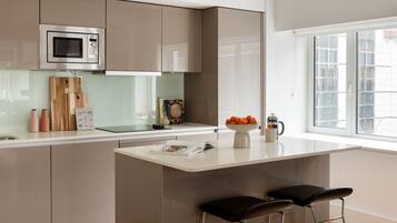 Penthouse, 2 Bedrooms | Private kitchen | Full-size fridge, microwave, oven, stovetop