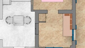 A floor plan of a hotel room with a bed, a desk, and a seating area. - Tilos Villa - Apartment Comfort (Tilos)