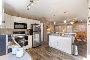 Fridge, microwave, oven, stovetop - Beautifully updated beach house in the heart of Kill Devil Hills by Sun Realty (Kill Devil Hills)