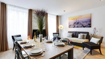 Premium Apartment | Living area | 127-cm Smart TV with cable channels, Netflix, MP3 dock