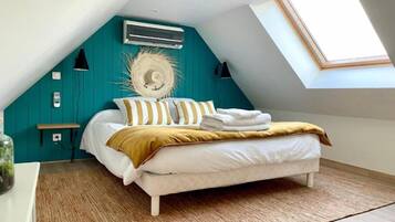 1 slaapkamer, een kluis op de kamer, een strijkplank/strijkijzer