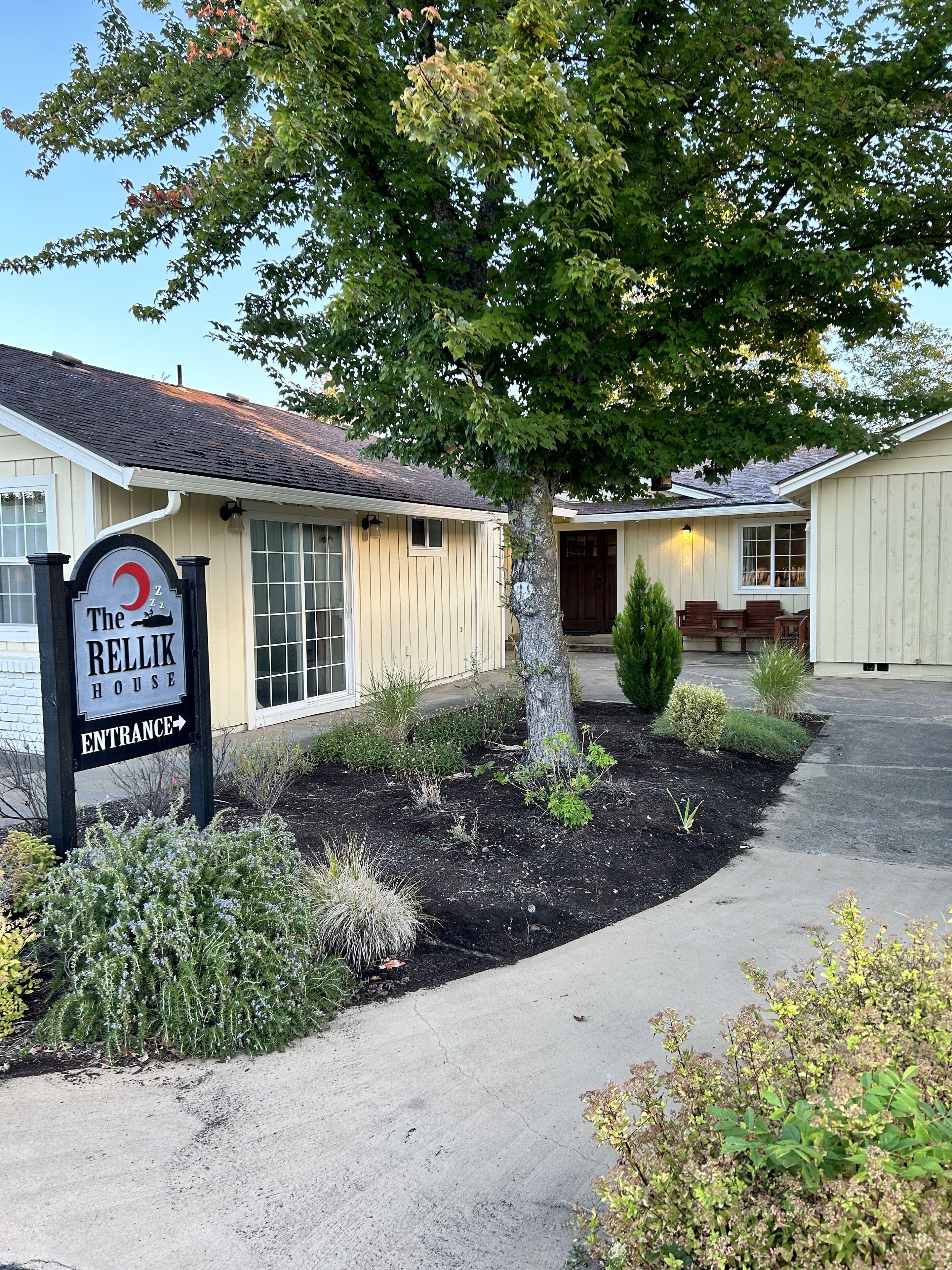 A building with a sign reading "The Relik House" and an entrance arrow.